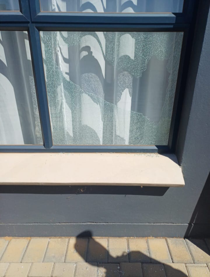 Broken window glass before replacement — Gauteng