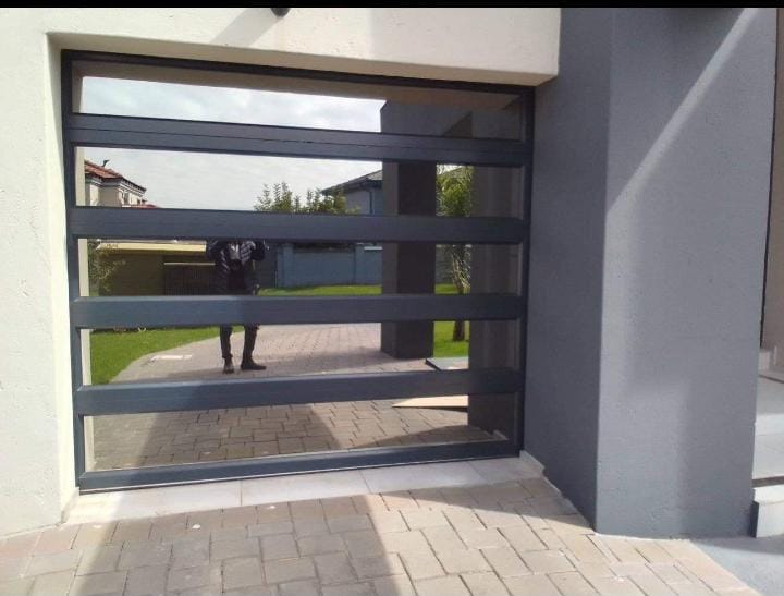Single aluminium glass garage door Waterfall Estate Trideniel
